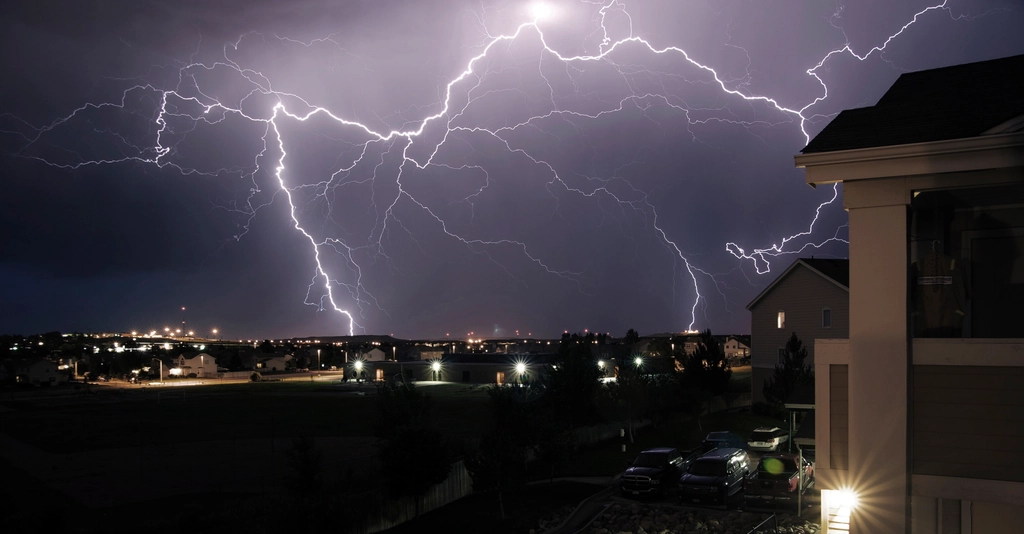 Thunderstorm lightning night sky photo